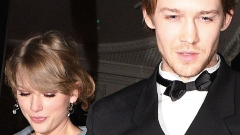 Taylor Swift and Joe Alwyn leaving event