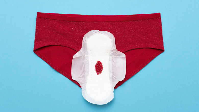 red underwear with pad on top