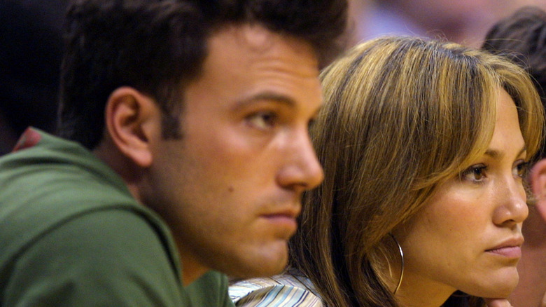 Jennifer Lopez and Ben Affleck at a basketball game. 