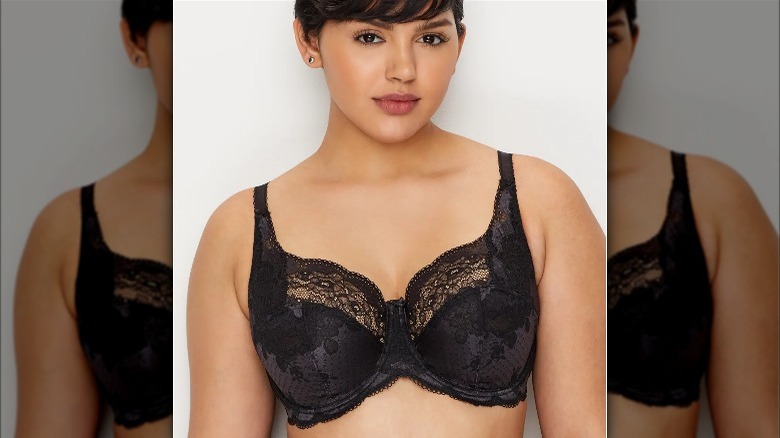 model wearing black lace Panache bra