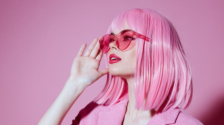A woman with pink hair 