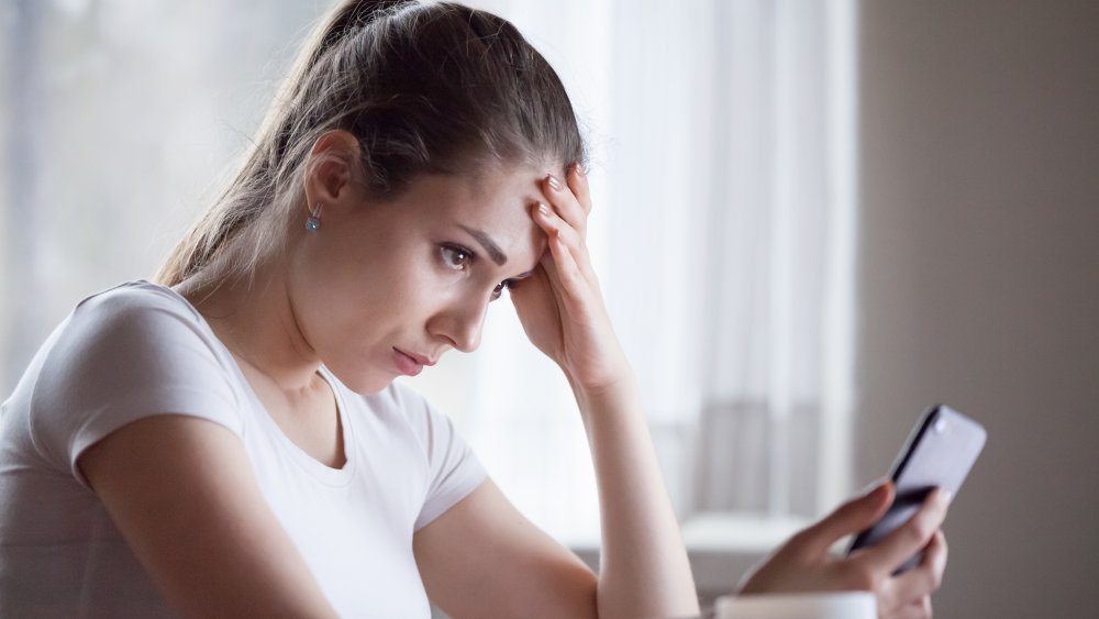 Woman checking texts