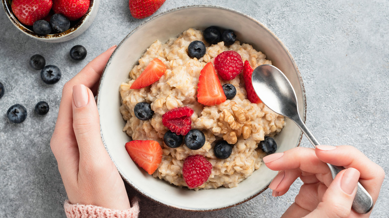 Woman eating oatmeal