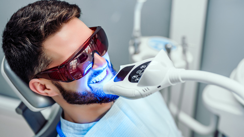 man getting a teeth whitening procedure