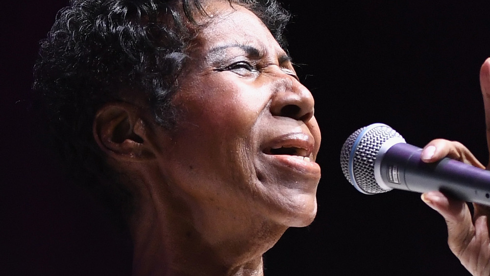 Aretha Franklin singing at an event