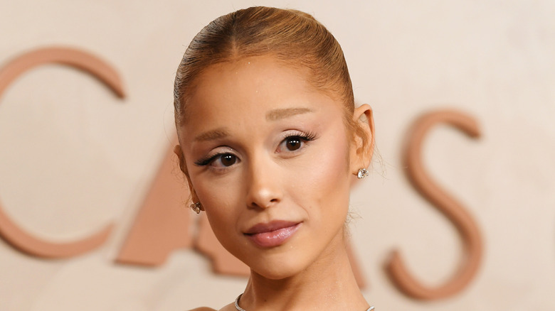 Ariana Grande posing at the Oscars.