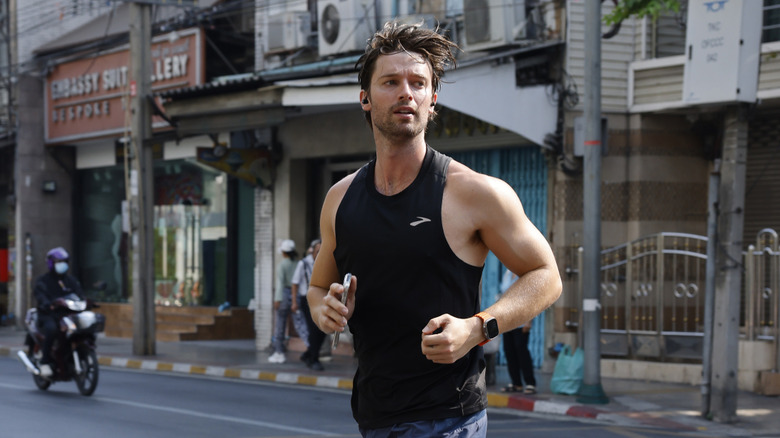 Patrick Schwarzenegger running in Thailand