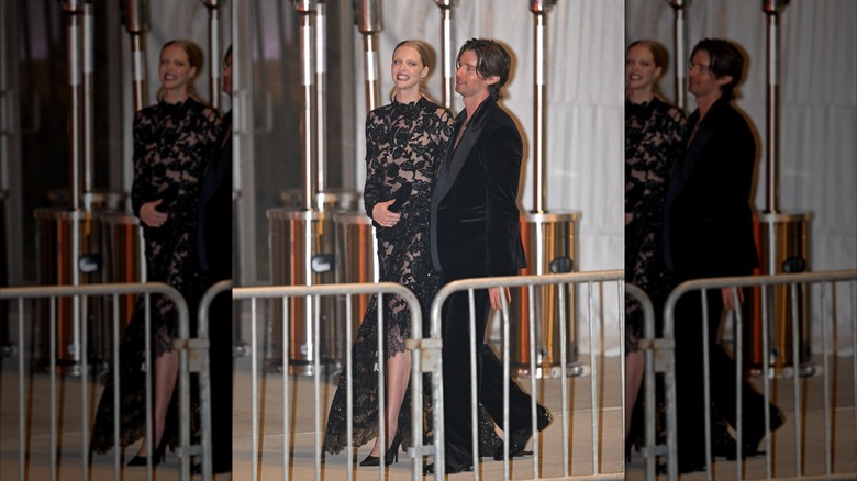 Patrick Schwarzenegger and Abby Champion laughing together.