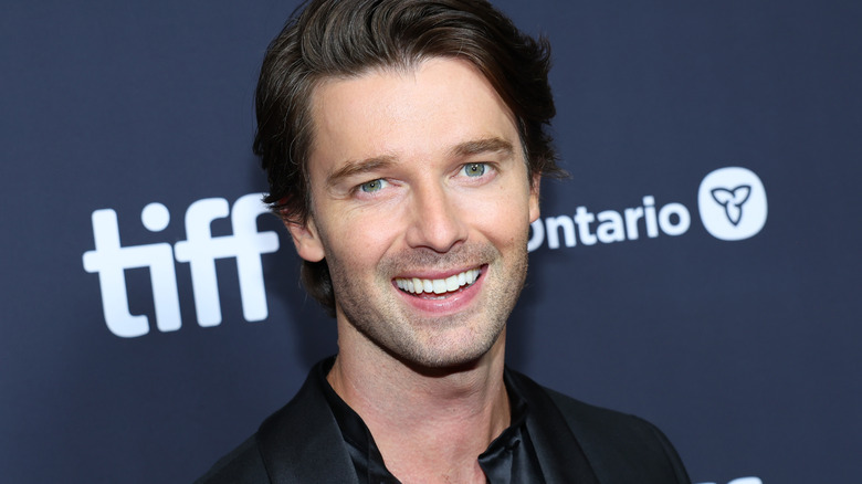 Patrick Schwarzenegger smiling.