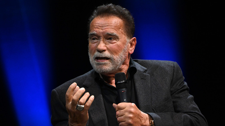 Arnold Schwarzenegger speaking at an event