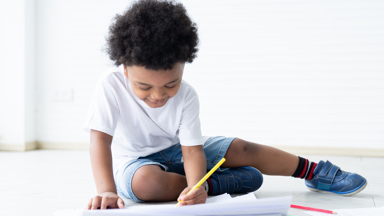 Little boy coloring