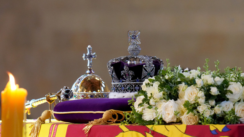 Crown and floral wreath on top of Queen Elizabeth II's casket 
