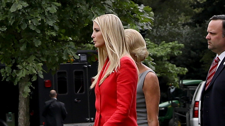 Ivanka Trump walking with Betsy DeVos