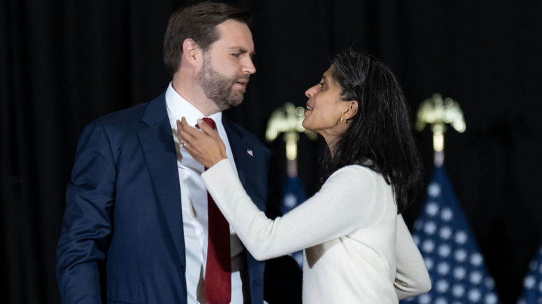 JD Vance arrives with his wife Usha Vance at the Vice Presidential Nominee's election rally at the Cobb Galleria Center in Atlanta, Georgia, in November 2024.
