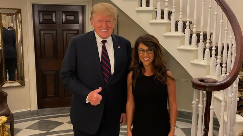 Donald Trump poses with Lauren Boebert