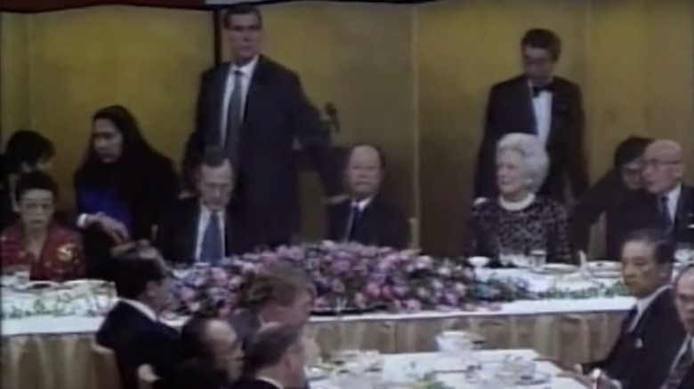 President George H. W. Bush (seated on the left in a blue tie) next to Japanese Prime Minister