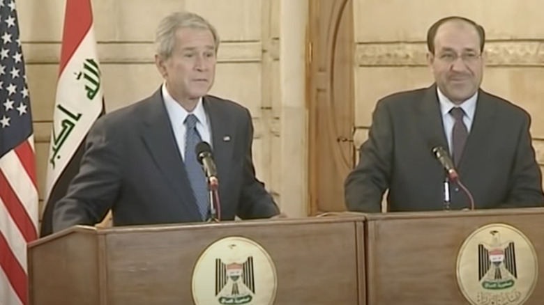 President George W. Bush and Prime Minister Nouri al-Maliki speaking side by side