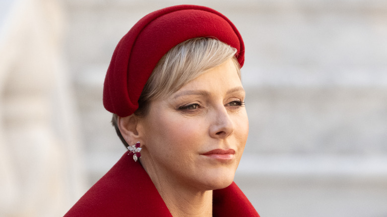 Princess Charlene squinting