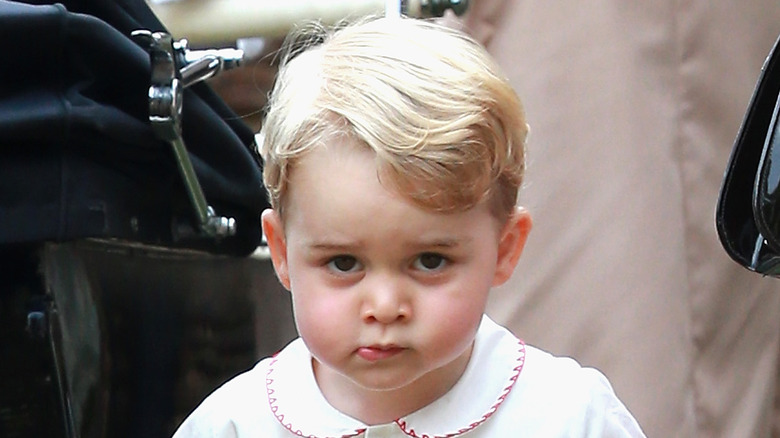 Young Prince George pouting 