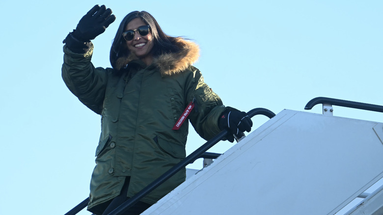 Usha Vance waving while exiting a plane in Greenland