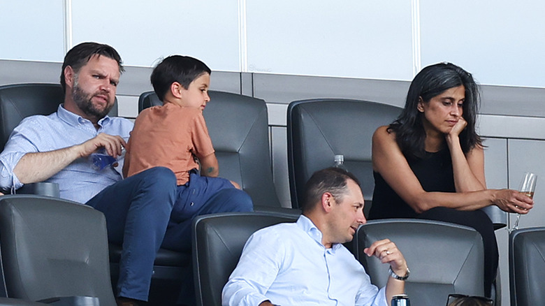 Usha Vance sitting apart from J.D. Vance at a baseball game in Ohio