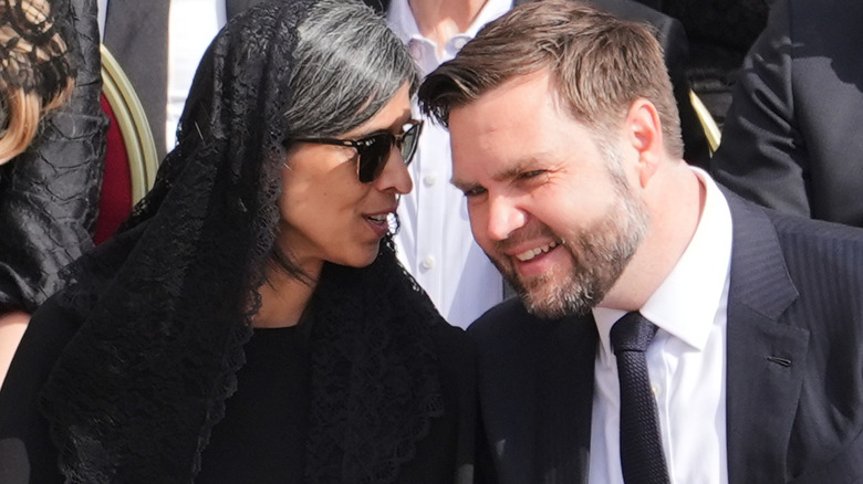 J.D. Vance and Usha Vance laughing and giggling in Rome