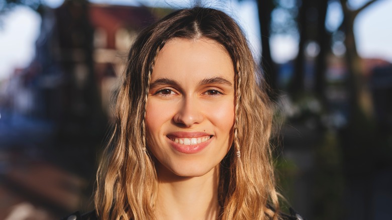 Woman with baby braids