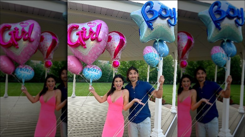 Ashley Iaconetti and Jared Haibon hold pink and blue balloons