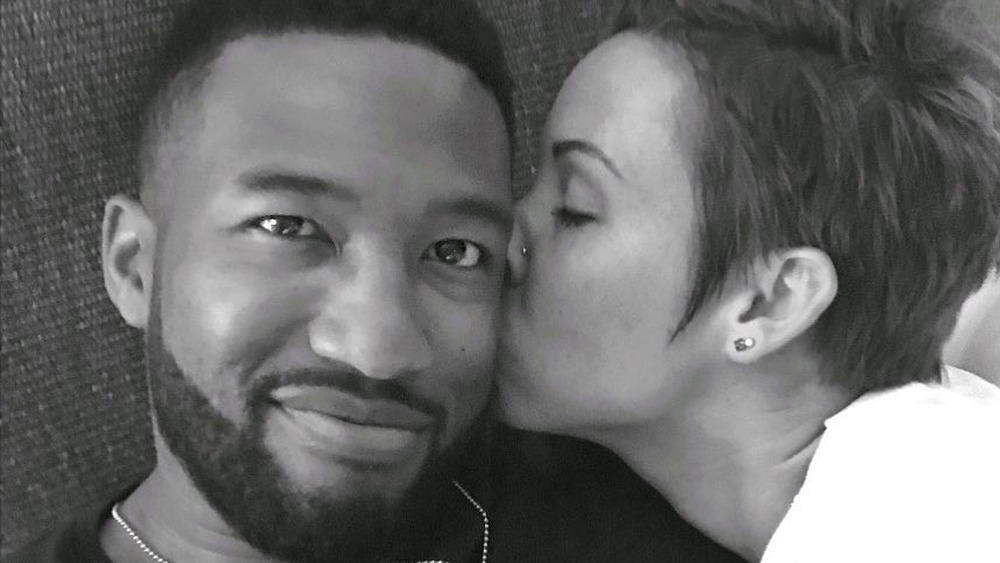 Marquel Martin smiling with Kari Kaisner