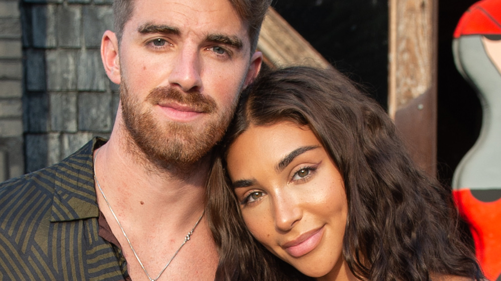 Chantel Jeffries and Drew Taggart snuggle up at an event