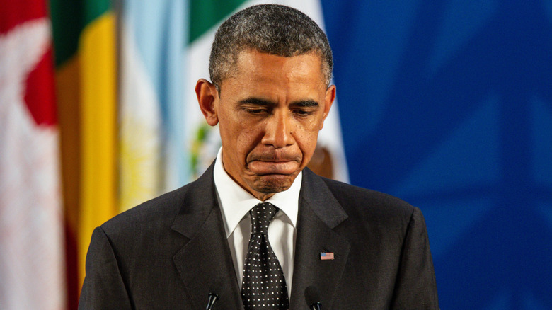 Barack Obama looking down