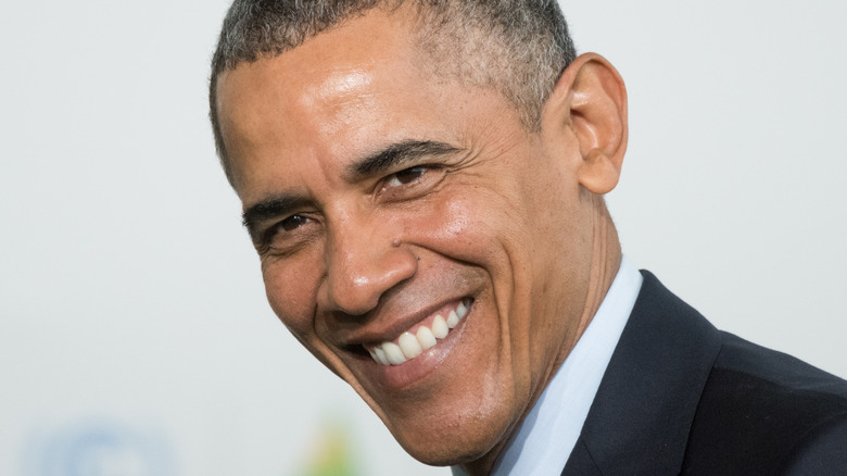 Barack Obama smiling head tilted