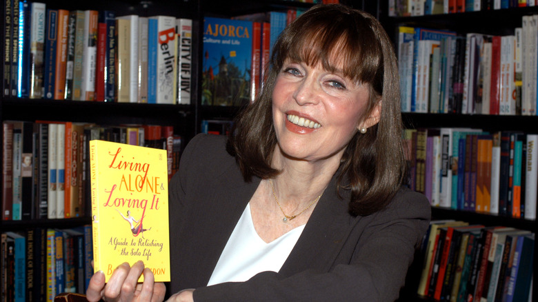 Barbara Feldon holding her book, "Living Alone and Loving It" at Book Soup in 2003