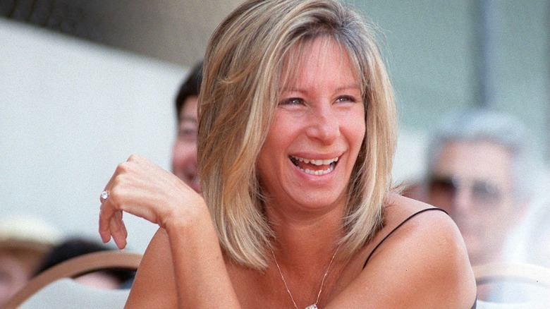Barbra Streisand laughing