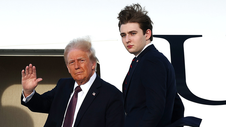 Donald Trump and Barron Trump boarding a plane