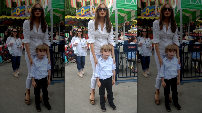Barron Trump and Melania Trump hang out at an amusement park in Central Park