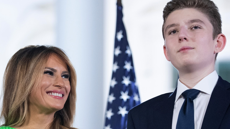 Melania Trump smiling alongside her son Barron Trump