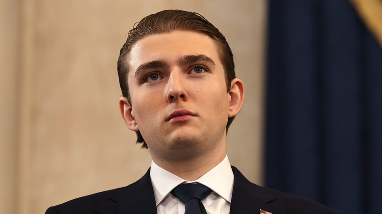 Barron Trump wearing a suit at president Donald Trump's inauguration.
