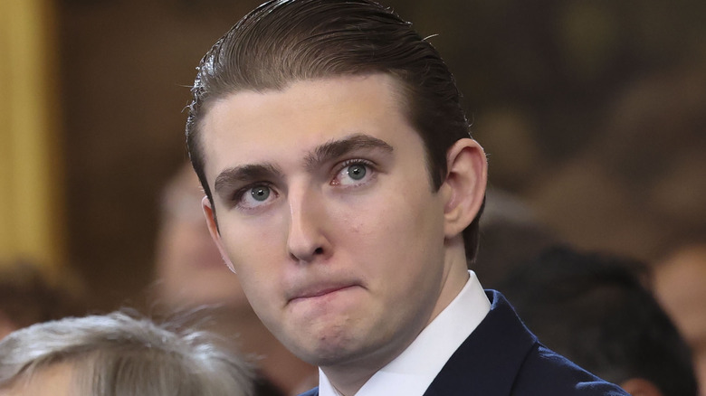 Barron Trump with his lips pursed