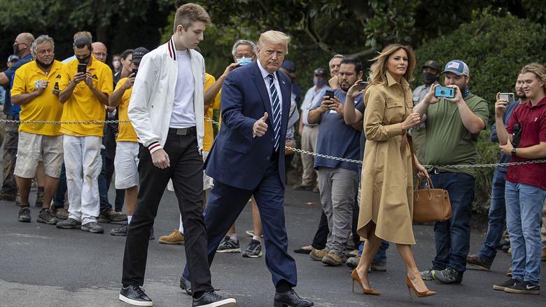 Barron Trump with parents