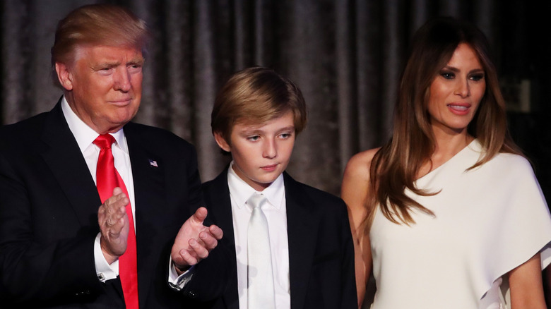 Barron Trump in 2016 with Donald and Melania Trump
