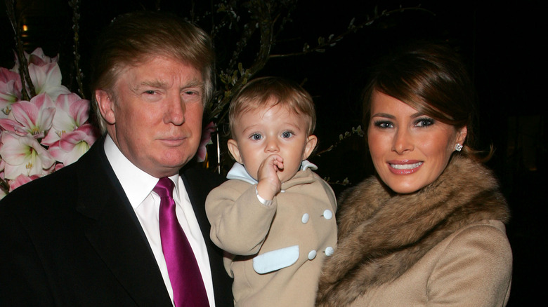 Young Barron Trump with his parents