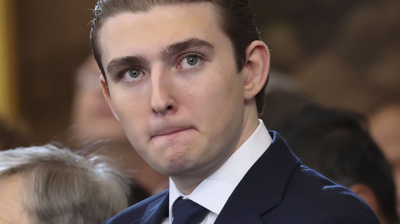 Barron Trump lips pressed together