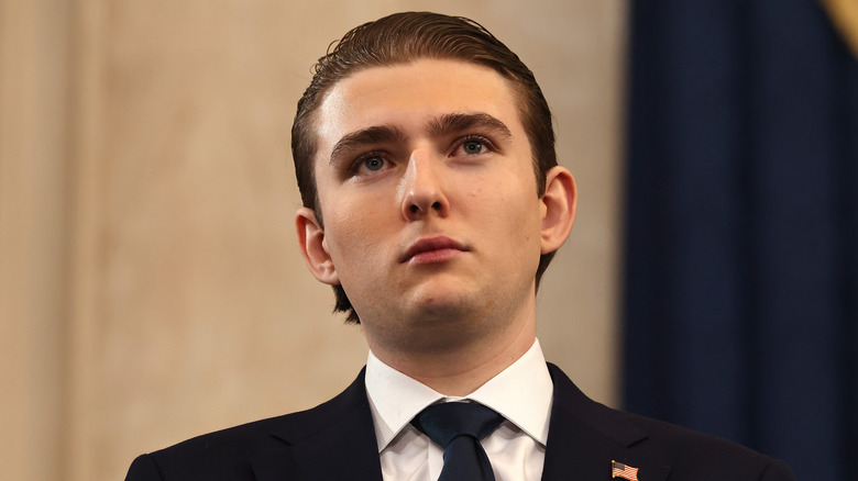 Barron Trump looking solemn during President Donald Trump's second inauguration