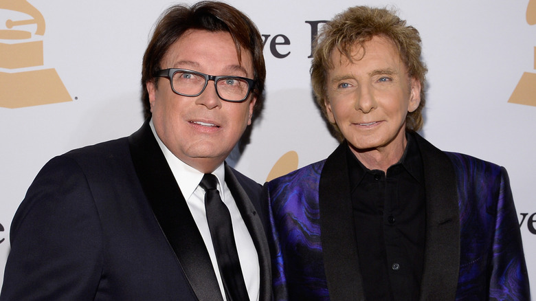 Garry Kief standing with Barry Manilow