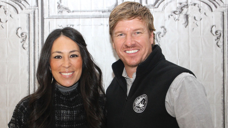 Joanna and Chip Gaines smiling in 2015