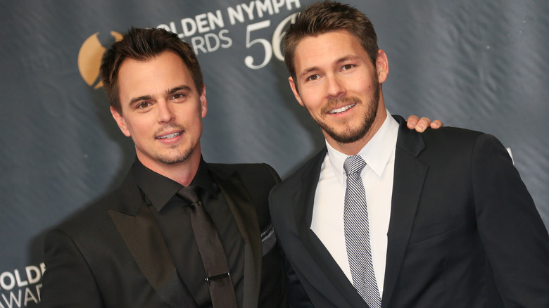 Darin Brooks and Scott Clifton grinning