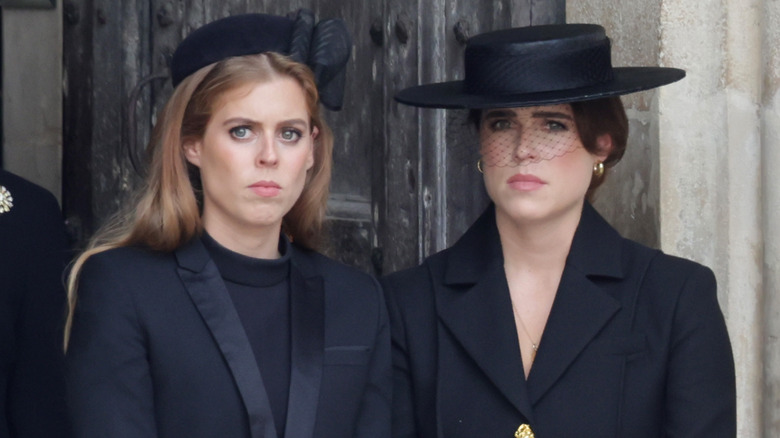 Princess Beatrice and Princess Eugenie posing 