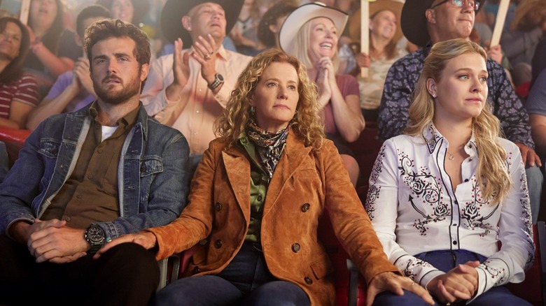 Cash, Isabel, and Missy sitting in audience in Ride