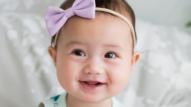 Baby with bow headband